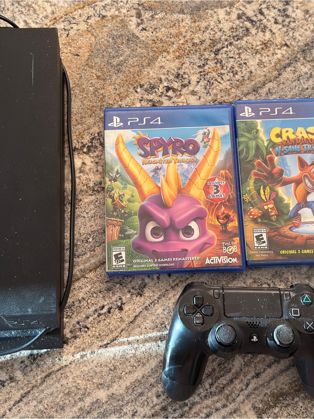 Sony PlayStation 4 Black Console with 2 PS4 Controllers and Spyro & Crash Games